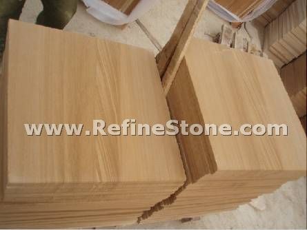 Yellow wooden sandstone tile