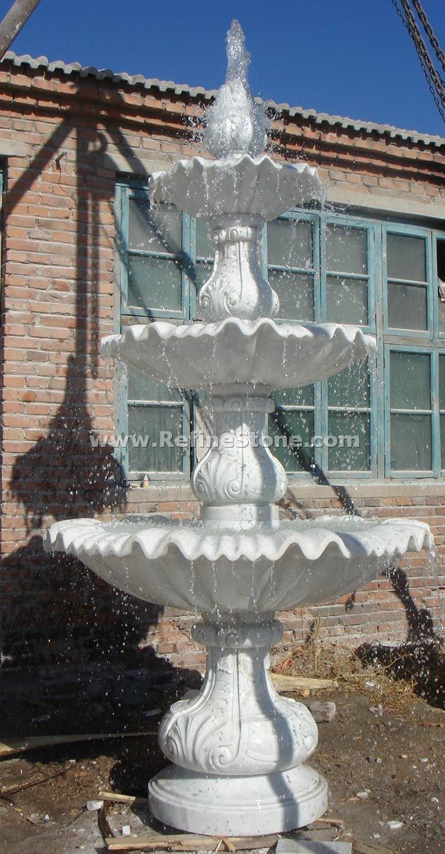 white marble fountain statue